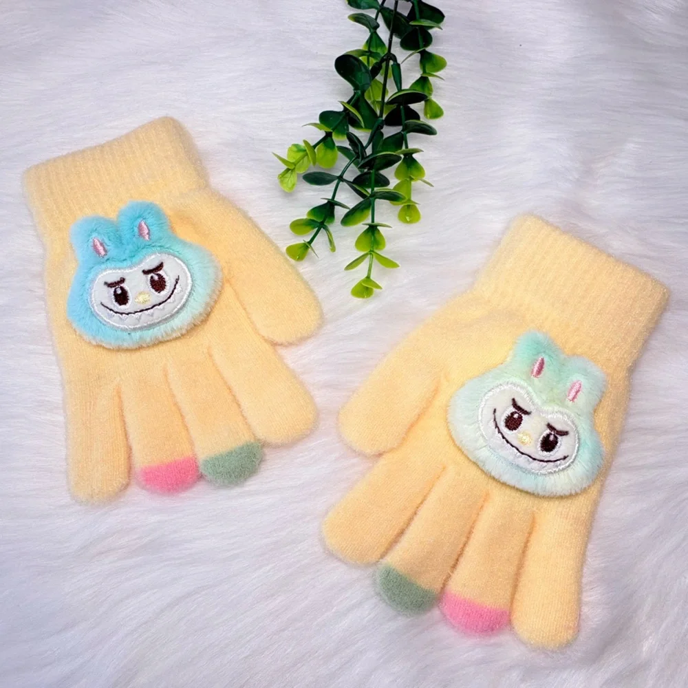 N/A gloves featuring yellow