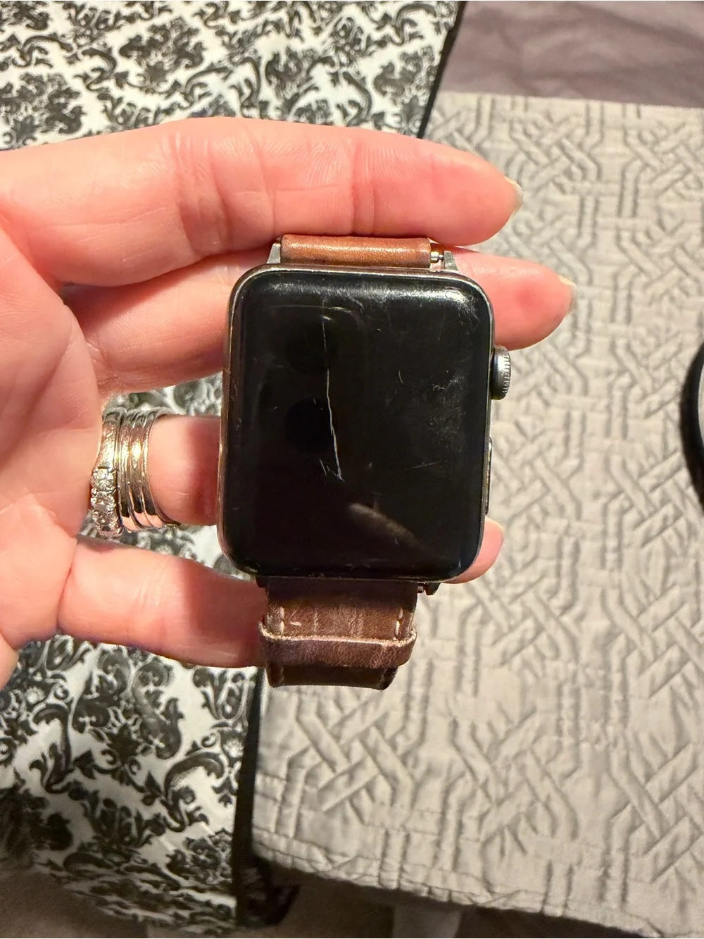 Apple Smartwatch with Brown Leather Strap and Black Screen