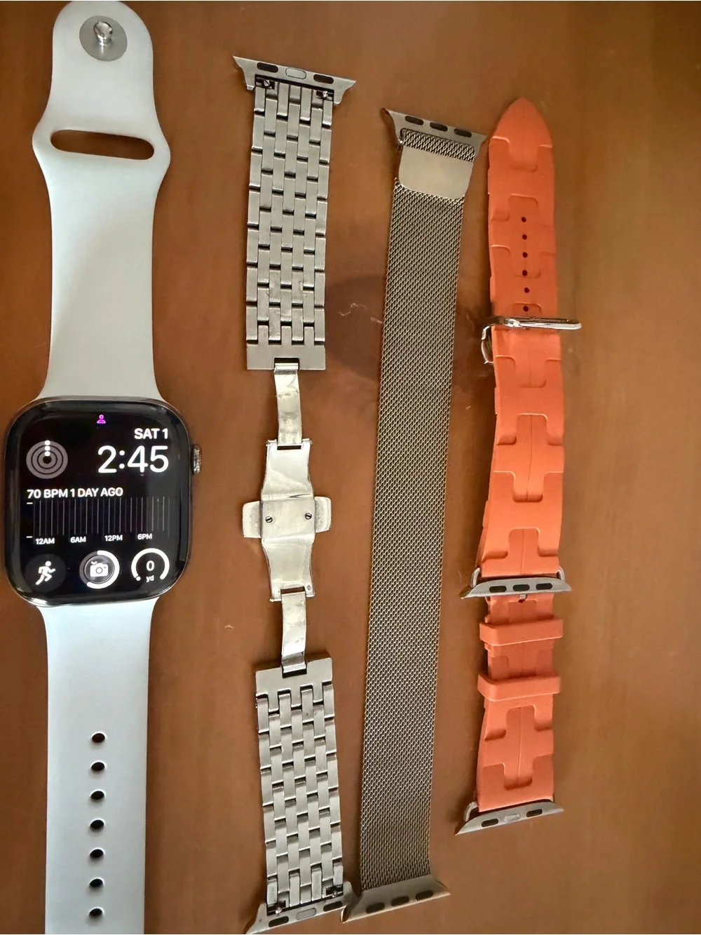 Apple Watch 10 Titanium 46 with three designer straps