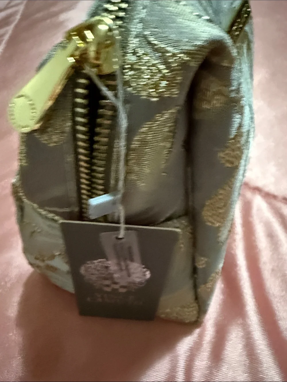 Vince Camuto references pouch