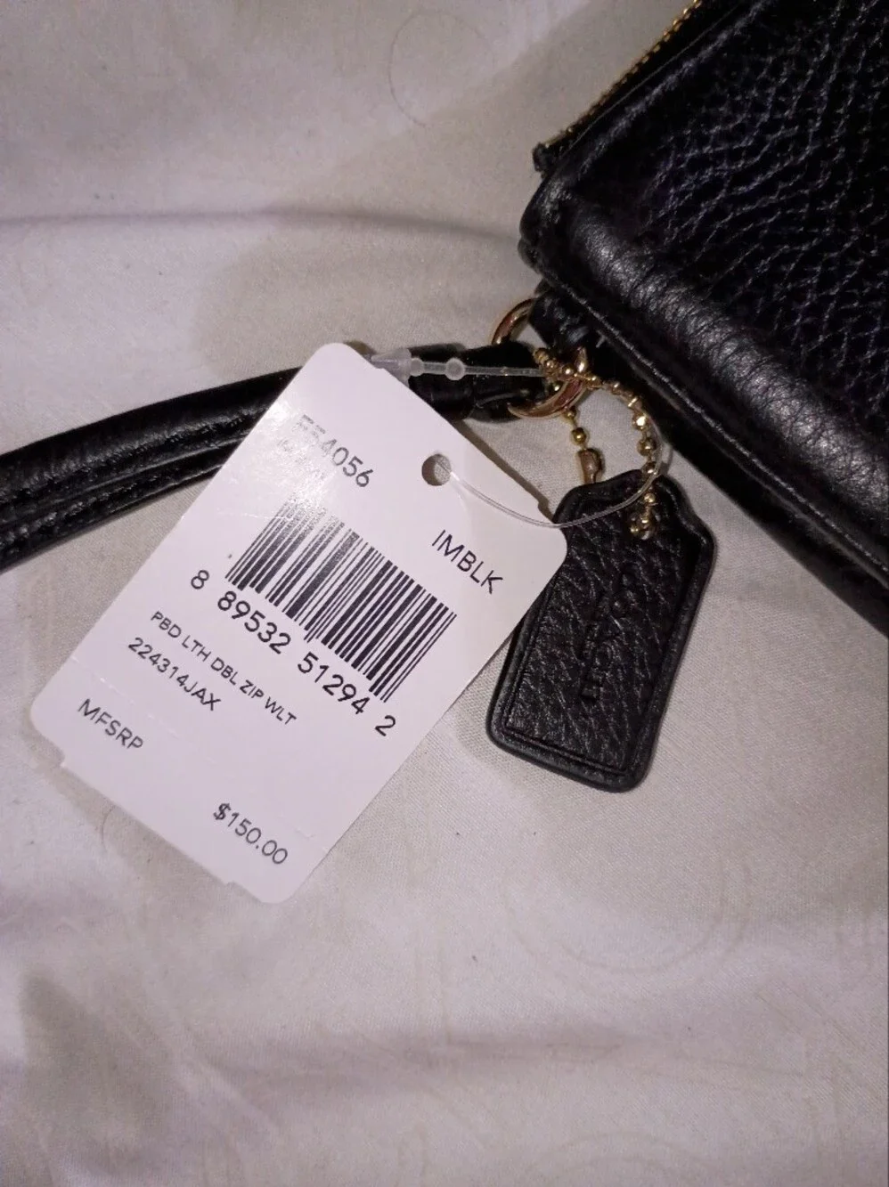 Coach wallet construction