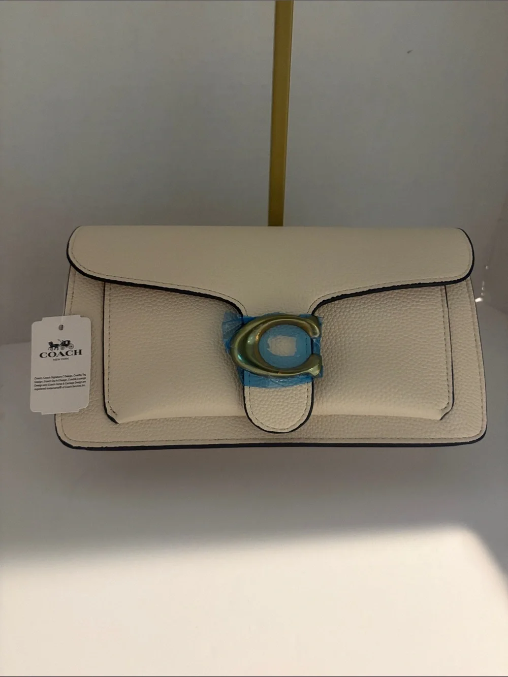 Coach Cream Pebbled Leather Clutch with Gold 'C' Accent