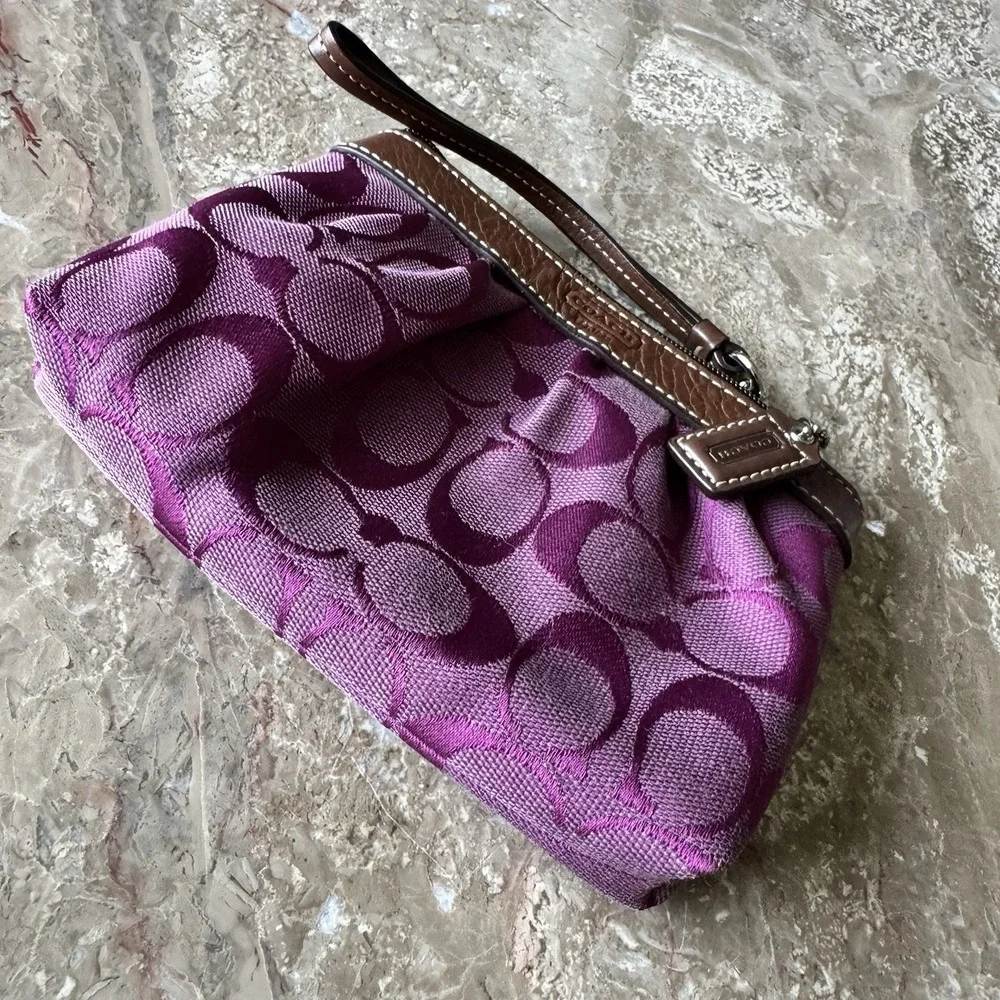 Coach purple logo