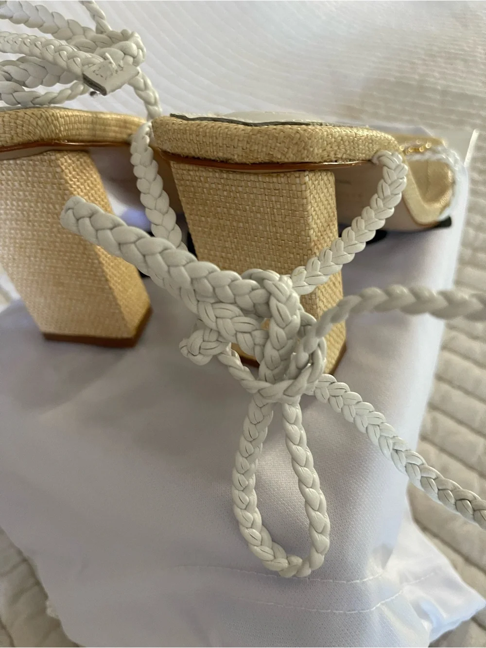 SCHUTZ White Braided Strap Sandals with Daisy detail at toe.