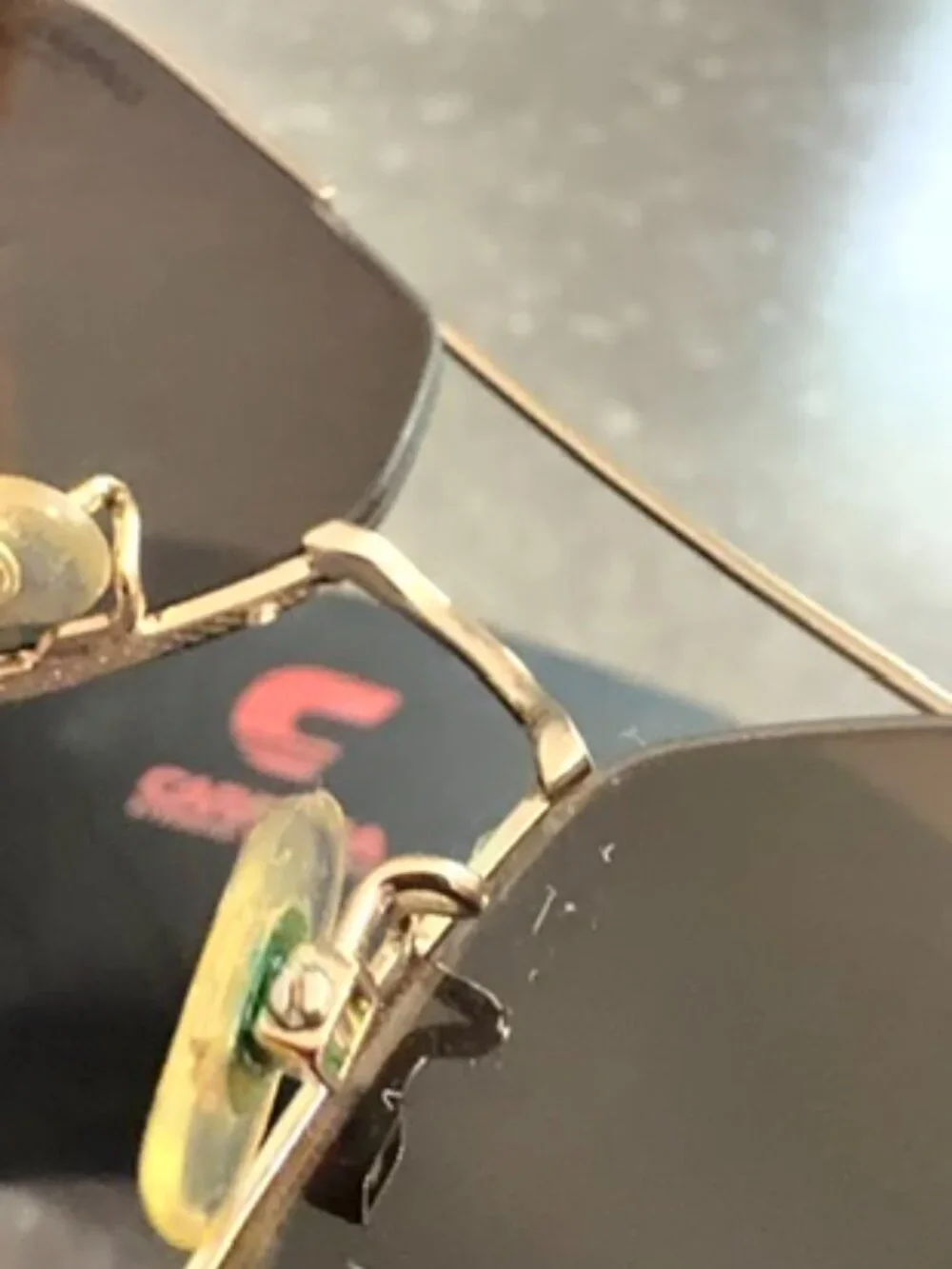 Carrera gold tone
