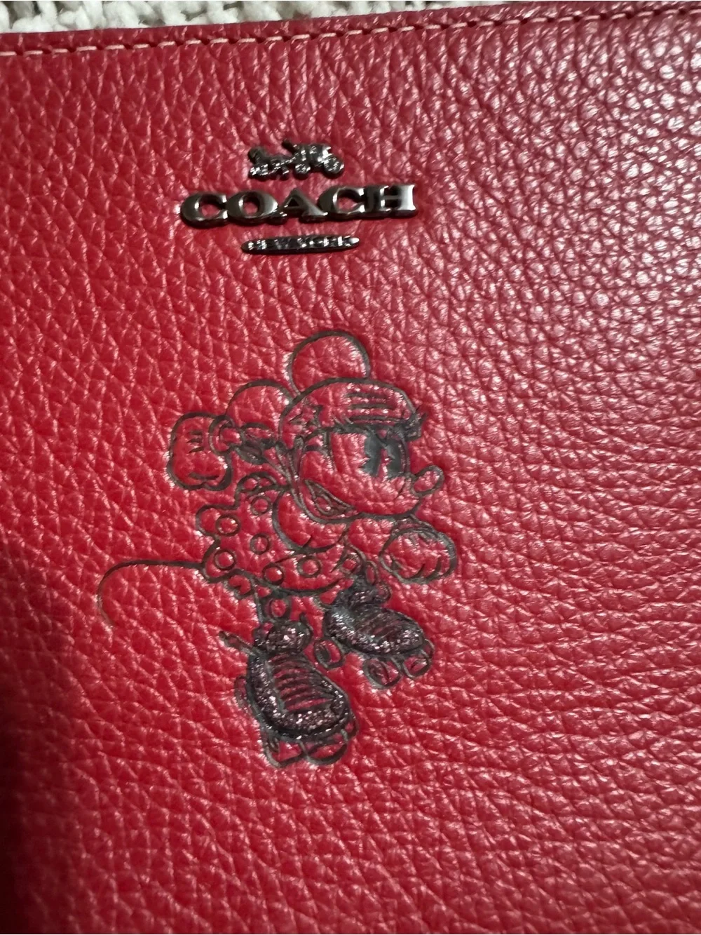 Coach compact pebbled