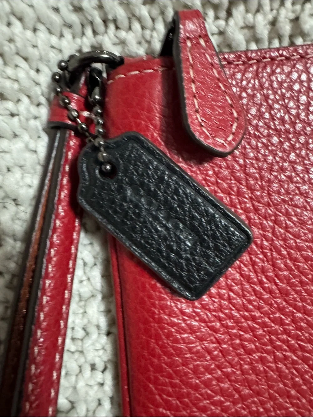 Coach compact pebbled