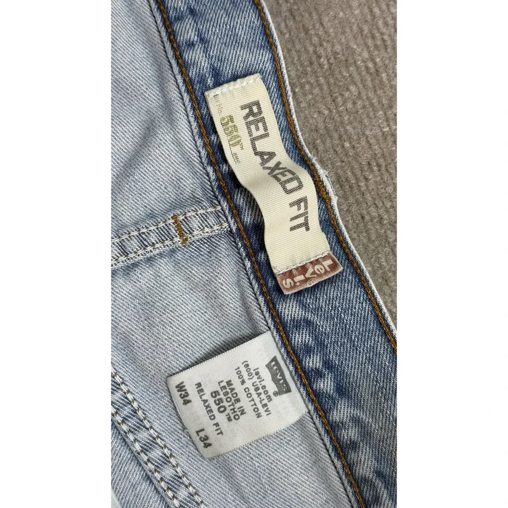 2005 Levis 550 Jeans Mens 34x34 Light‎ Wash Blue Denim Classic black wing
