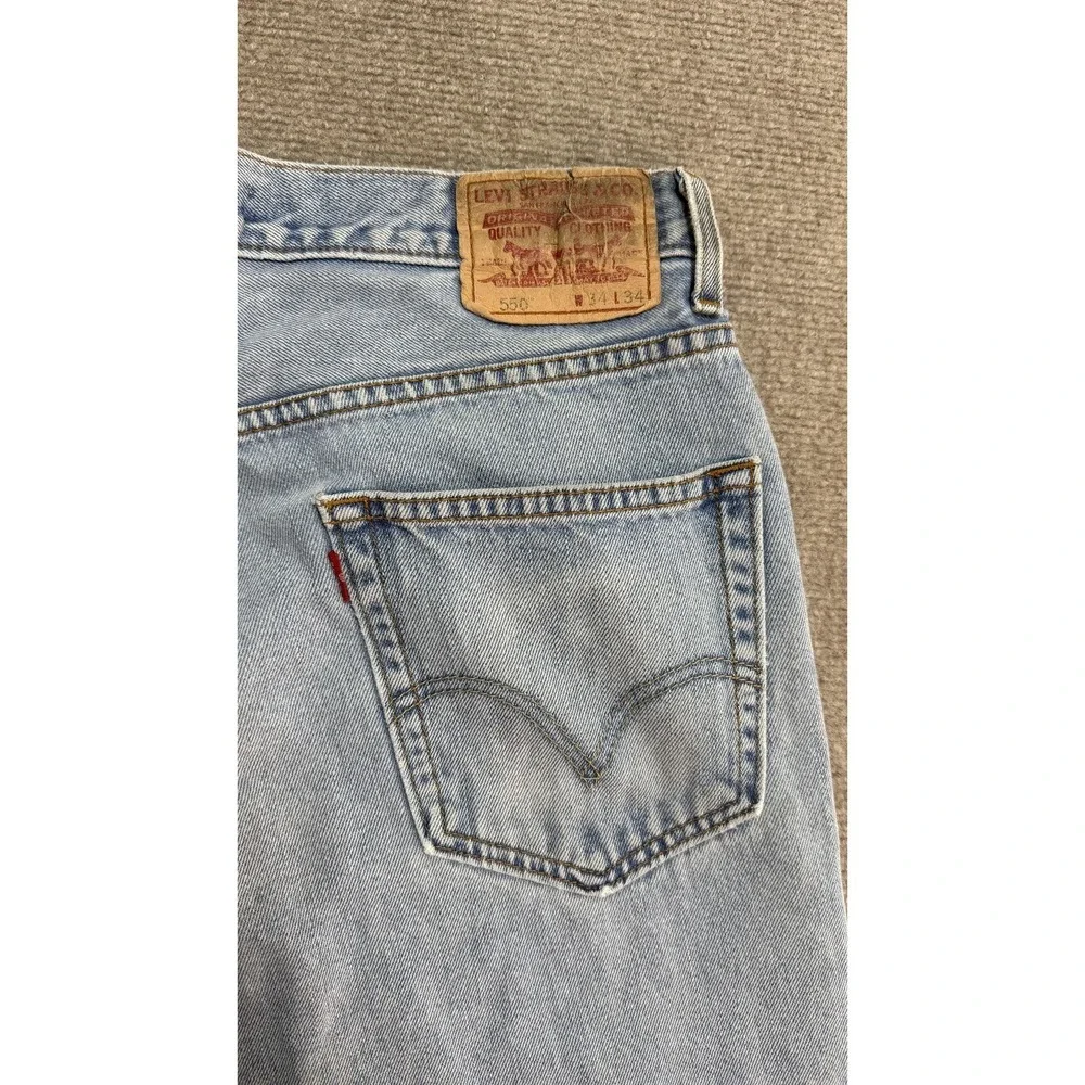 2005 Levis 550 Jeans Mens 34x34 Light‎ Wash Blue Denim Classic black wing