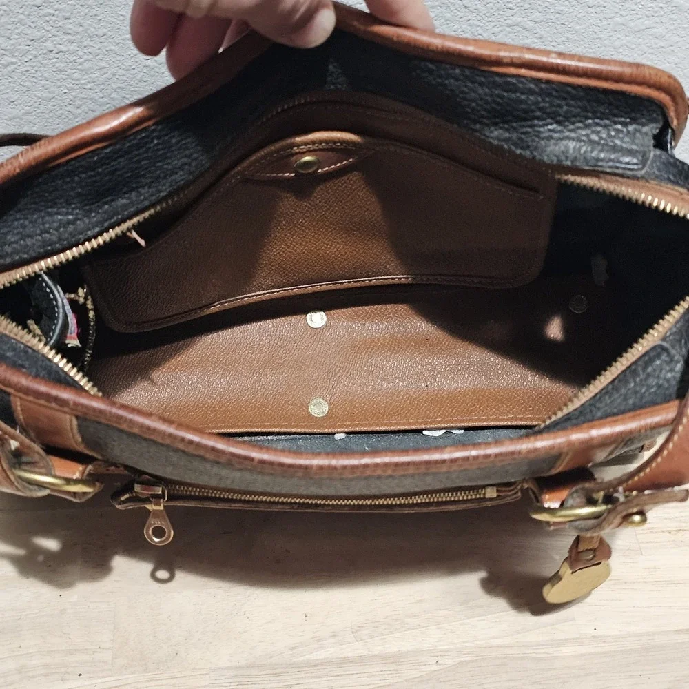 Dooney & Bourke zipper off