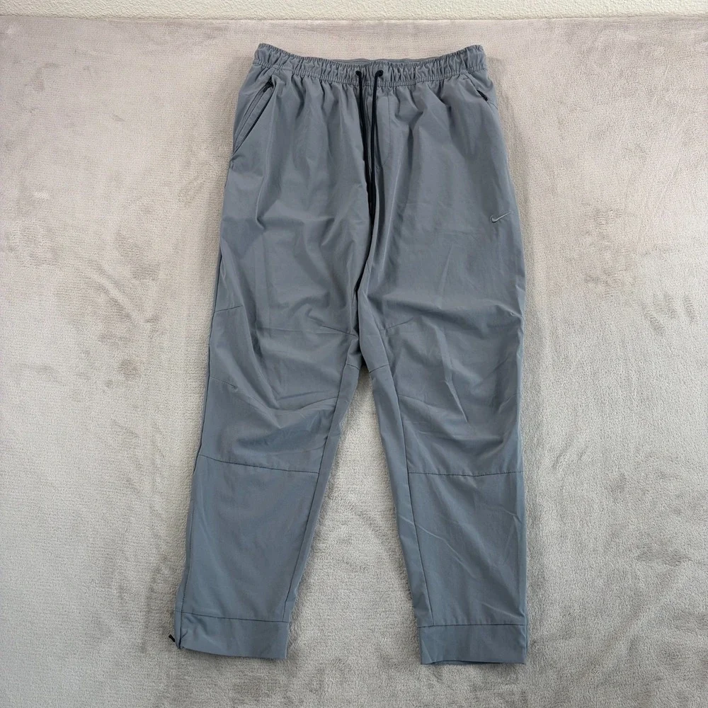 Nike Unlimited Versatile Pants Men Large Grey Dri-FIT Zippered Cuffs Performance