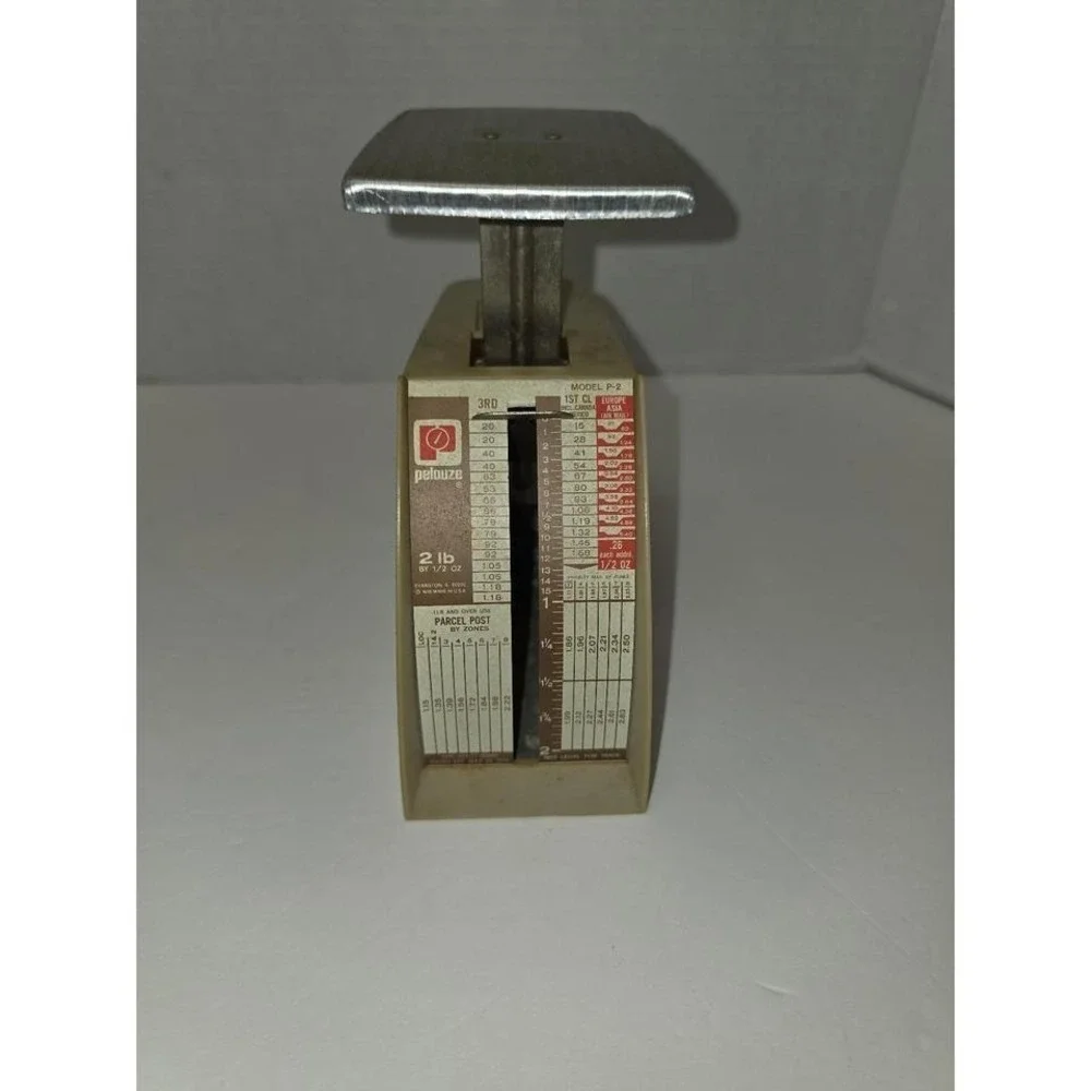 vintage Pelouze Model P-2 postal scale designed to weigh parcels up to 2 pounds.