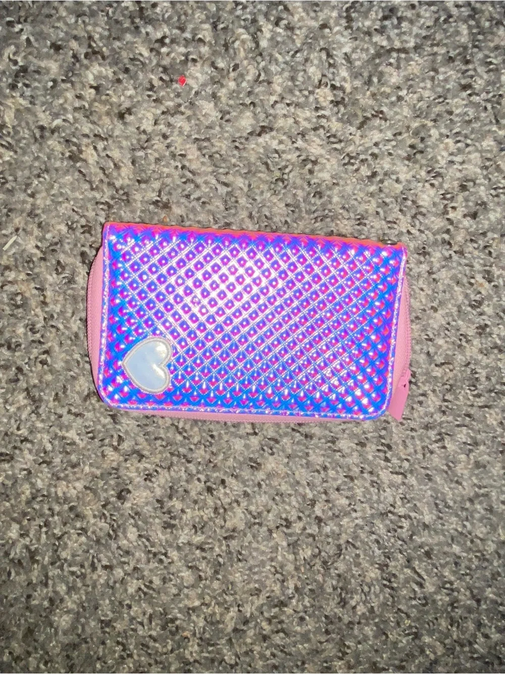 Pink heart embossed wristlet wallet