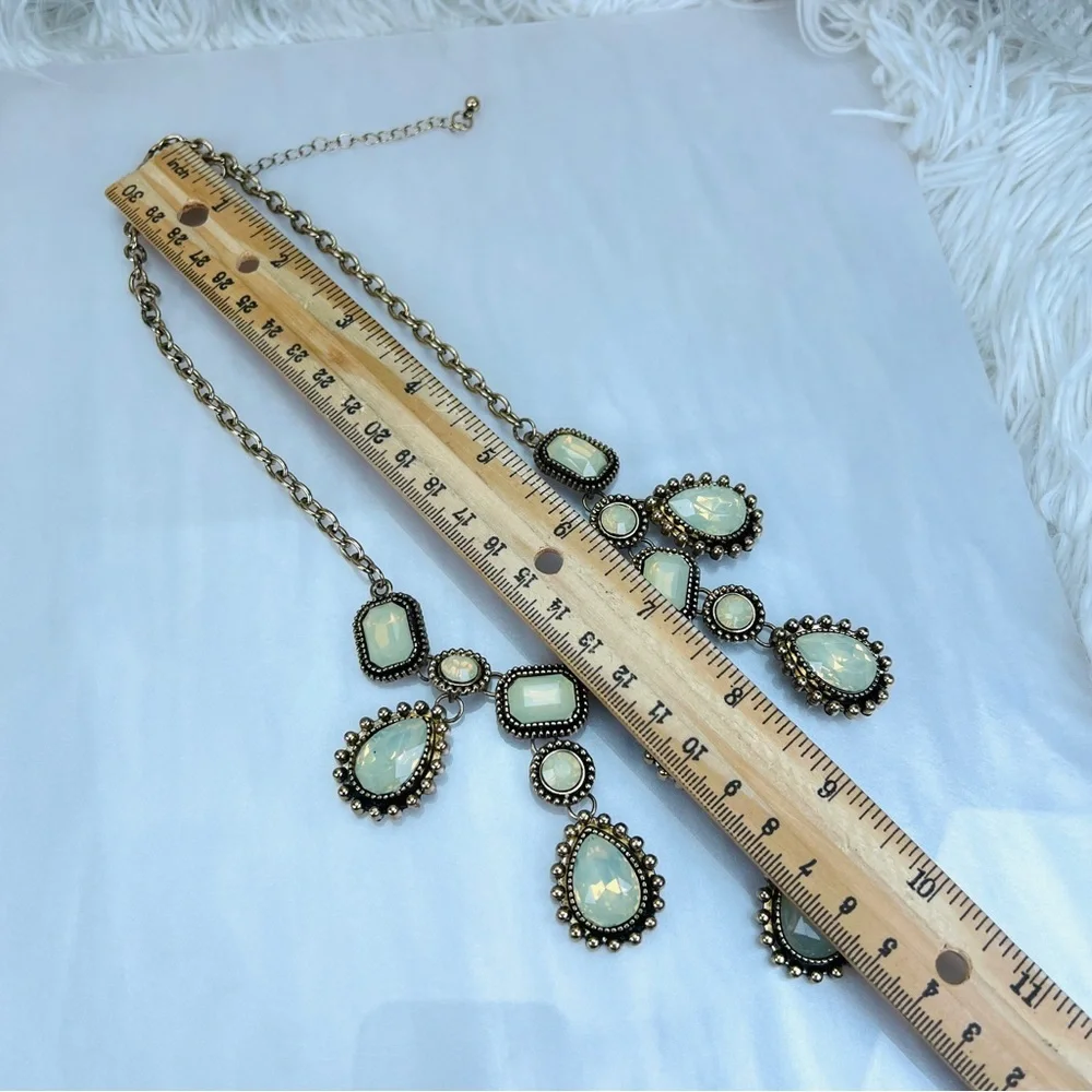 Gorgeous, aged goldtone, reflective statement, bib style necklace