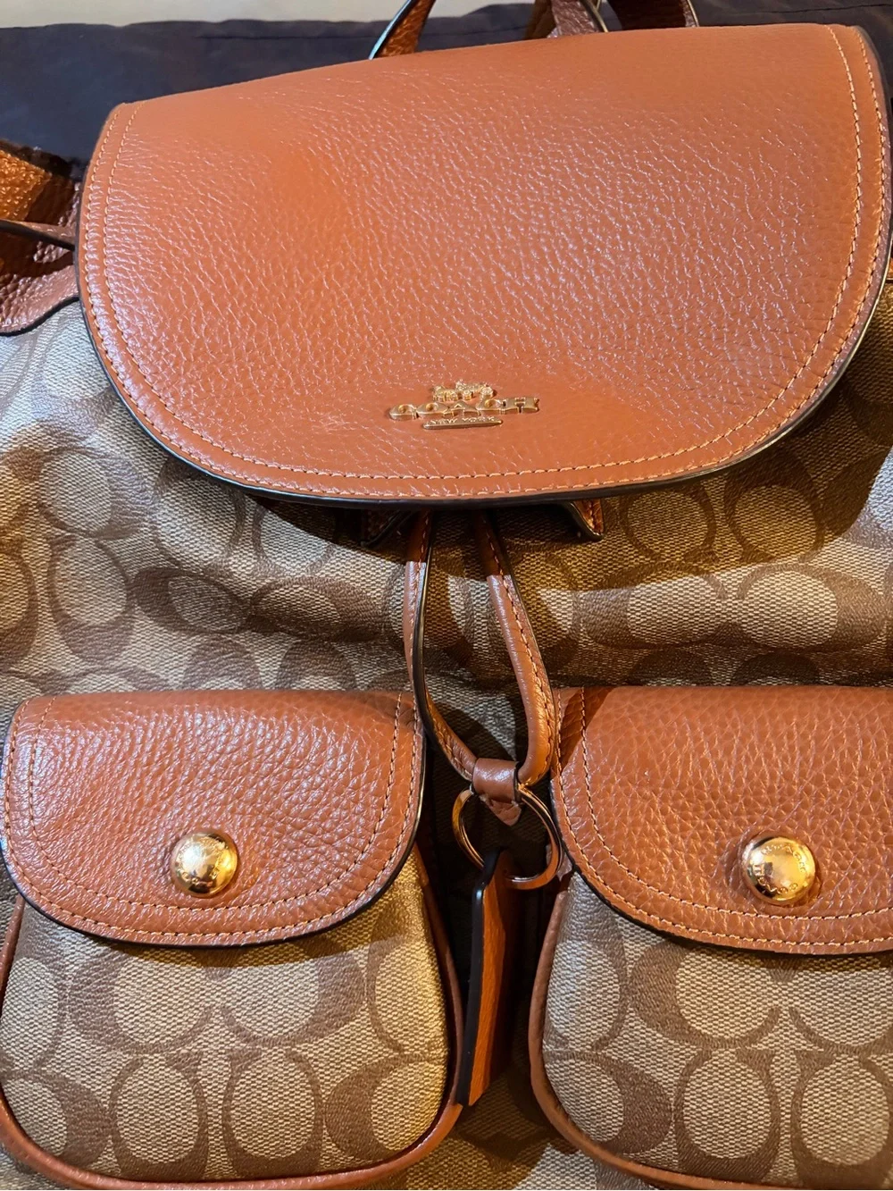 Coach Outlet Signature Canvas Drawstring Backpack in Brown/Tan, Gently Used.