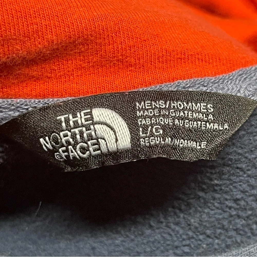 The North Face Men's Navy Hoodie with Orange Logo