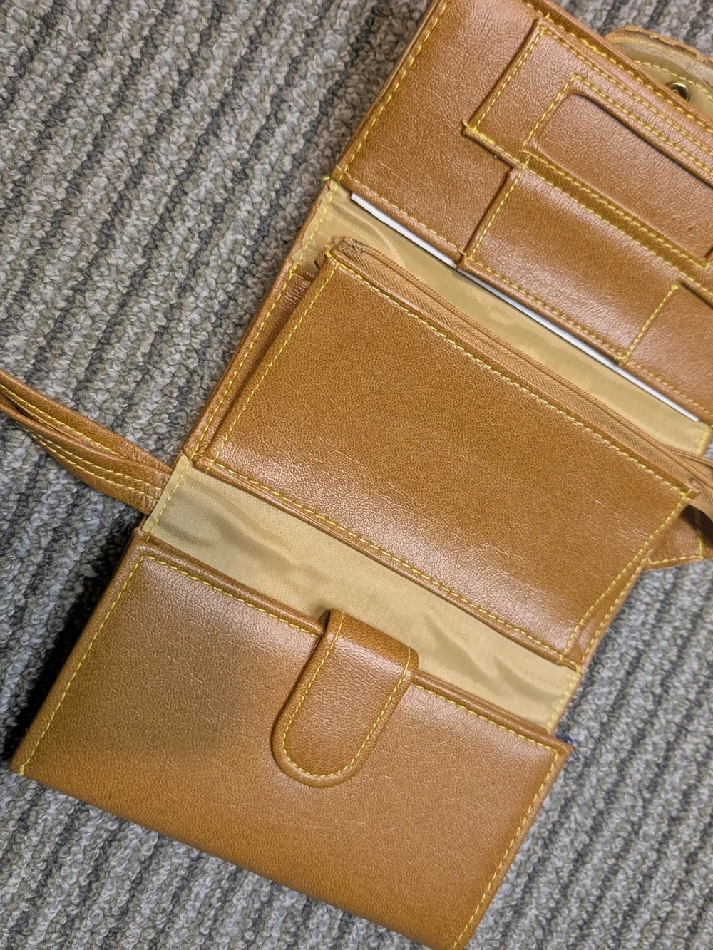 Vintage Tan Wristlet Wallet Rich cognac-tan wallet with wrist strap, snap closur