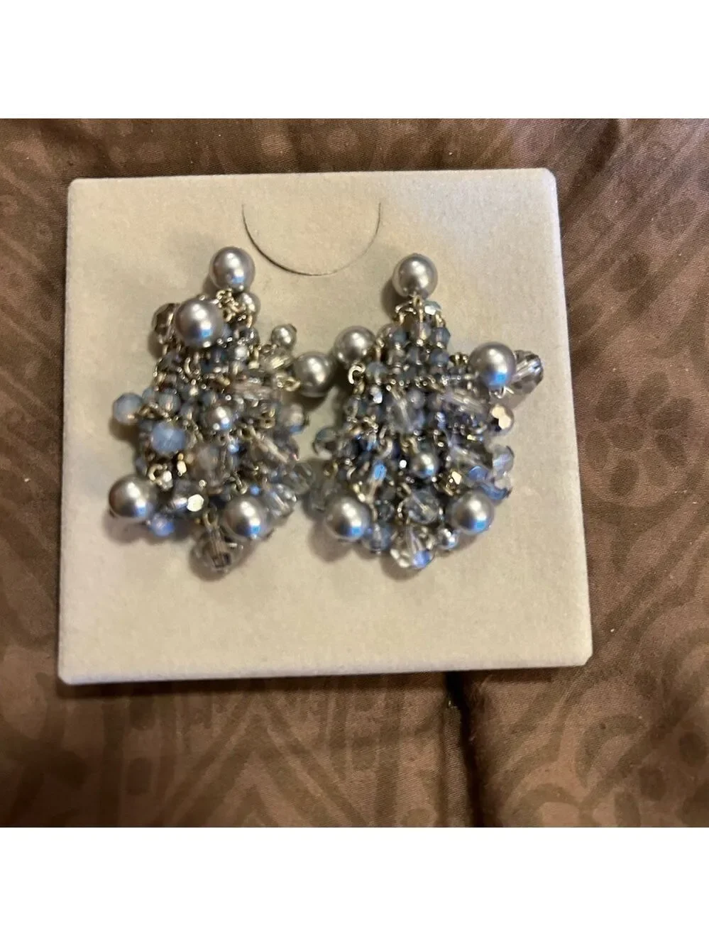daniel Swarovski paris very silver aprox