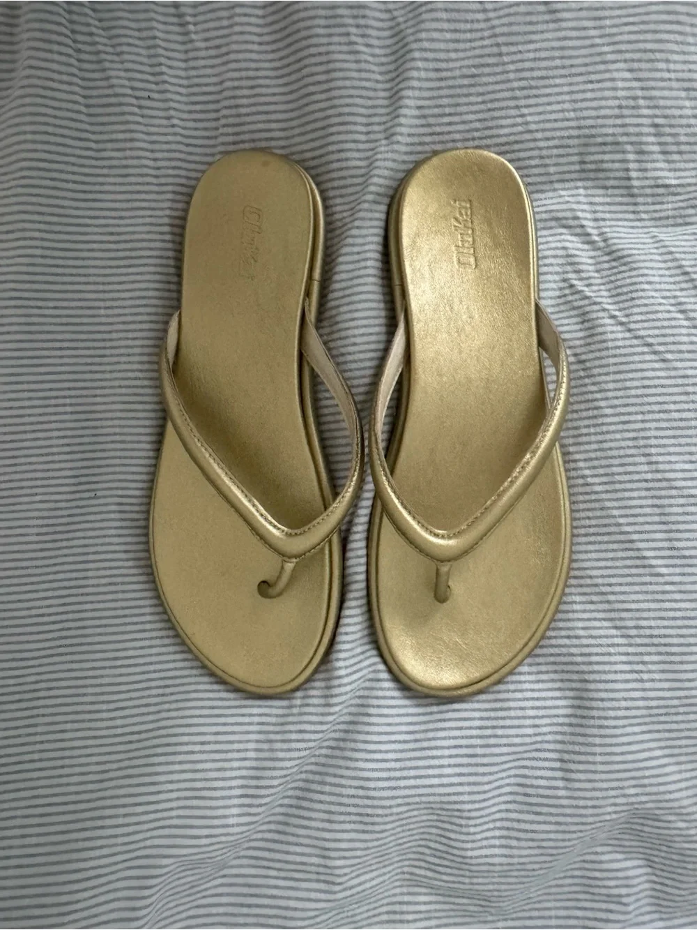 OluKai sleek metallic