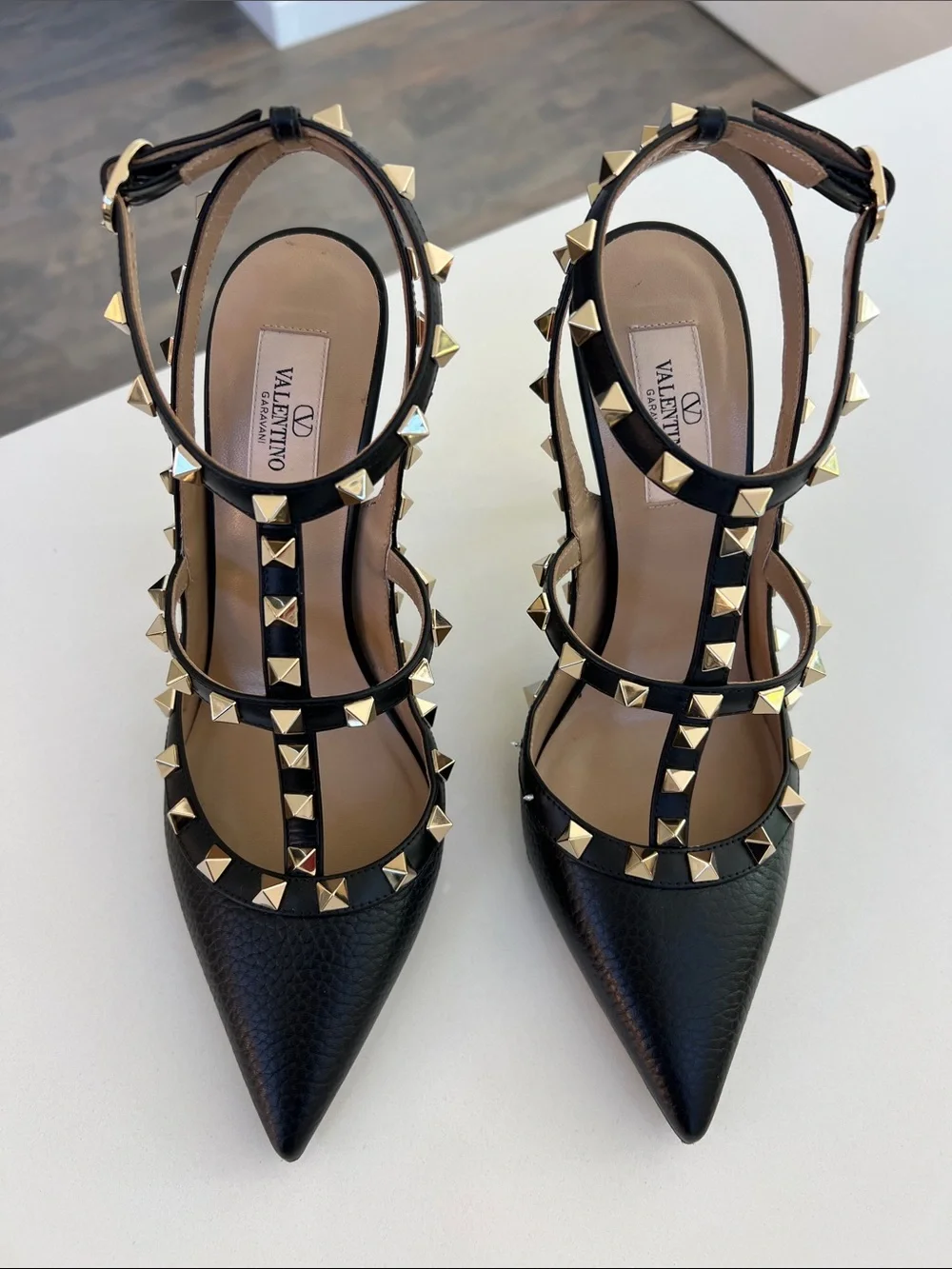 Valentino Garavani black grainy leather gold tone rockstud pointed toe pump heel