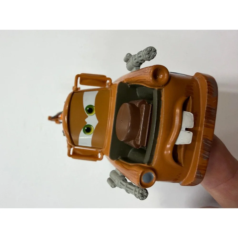 Disney Pixar Cars 2 Spy Mater Tow Truck with Gatling Guns Brown Toy Vehicle