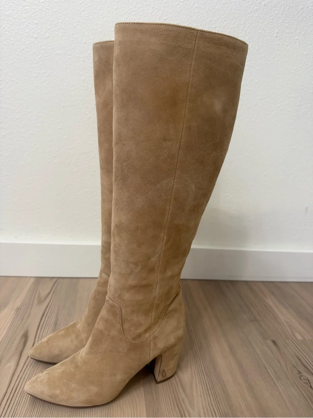 Sam Edelman tall over