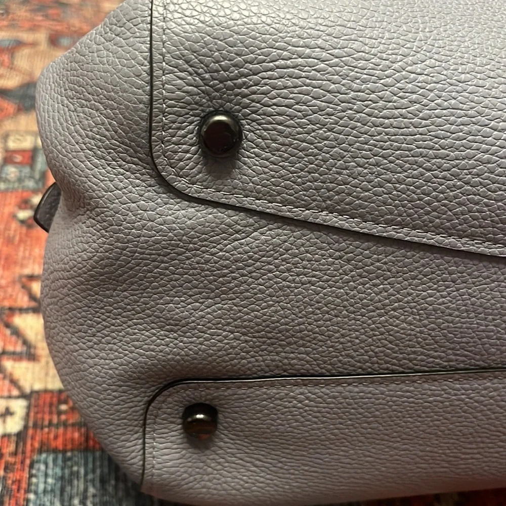 Coach polished pebble