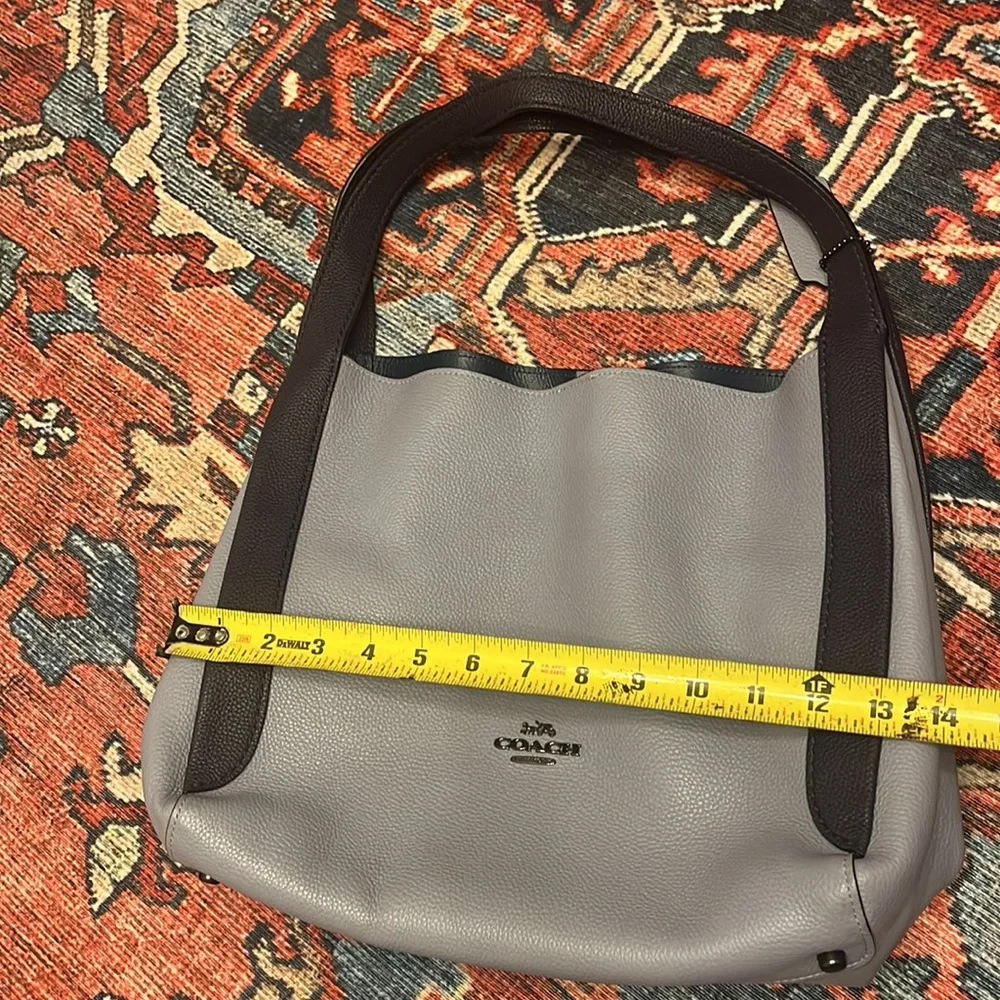 Coach polished pebble