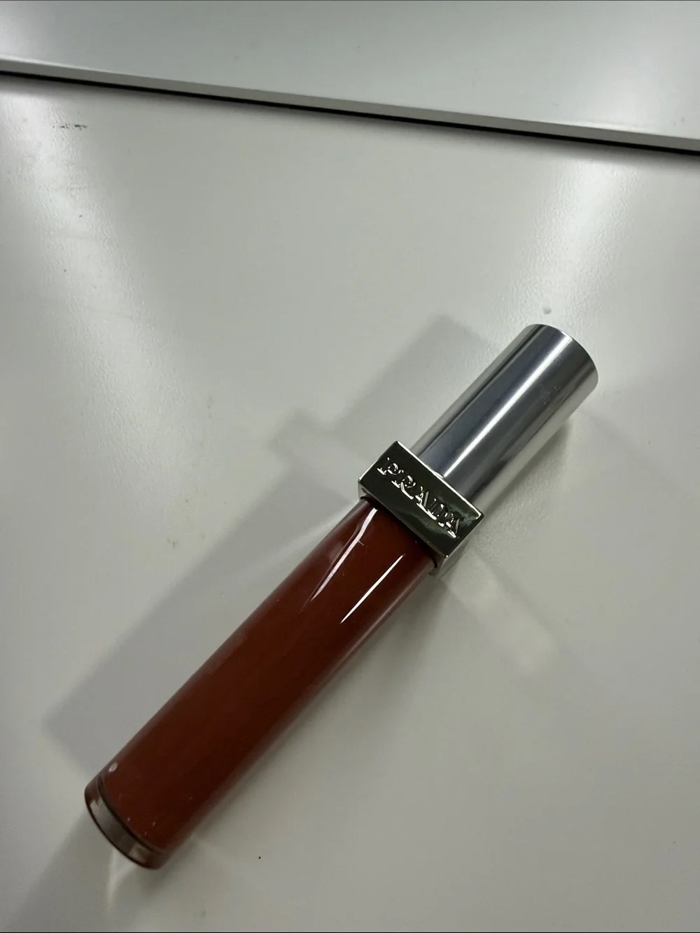 Prada glossy lip