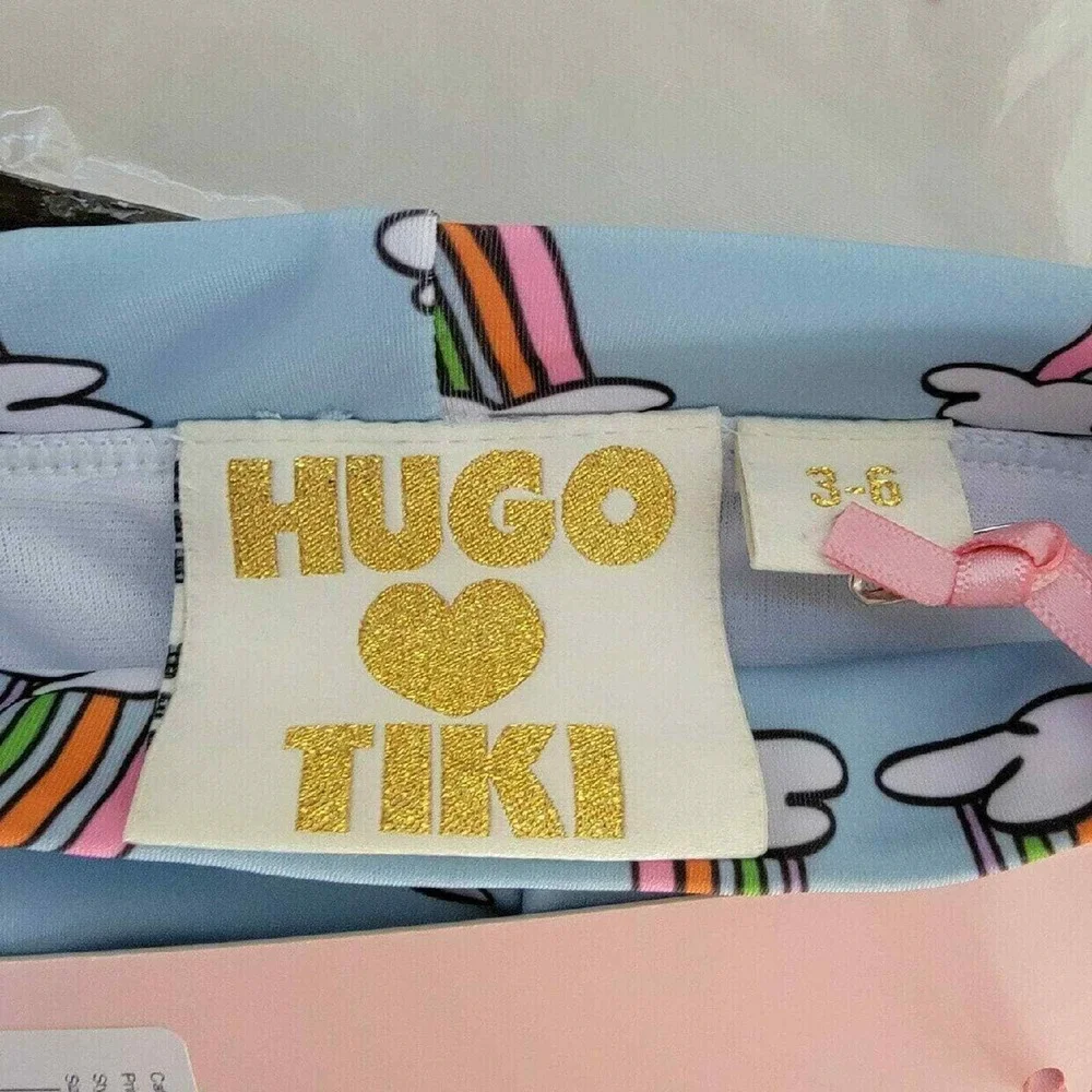 Hugo Loves Tiki blue rainbow