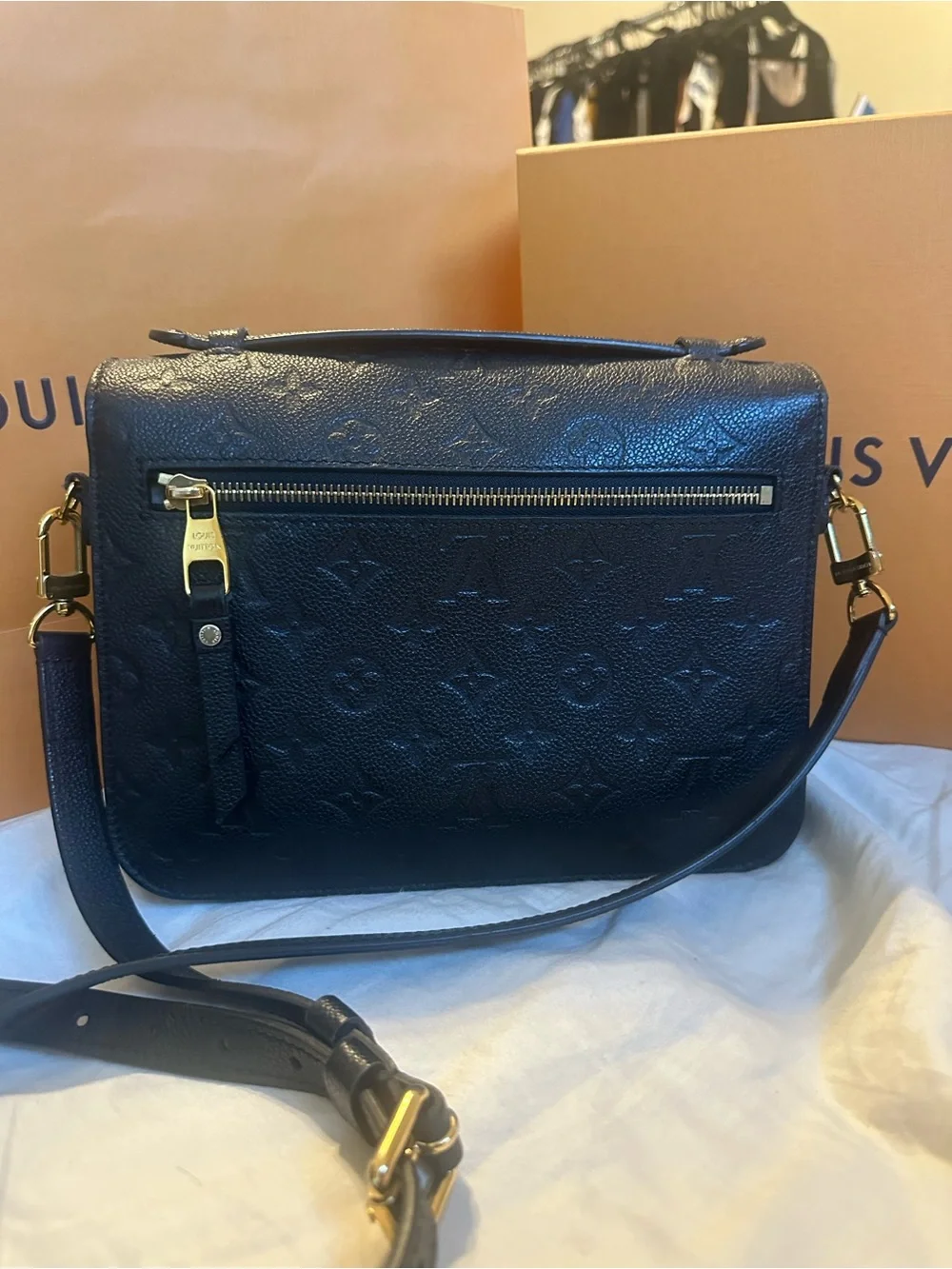 Louis Vuitton compact embossed