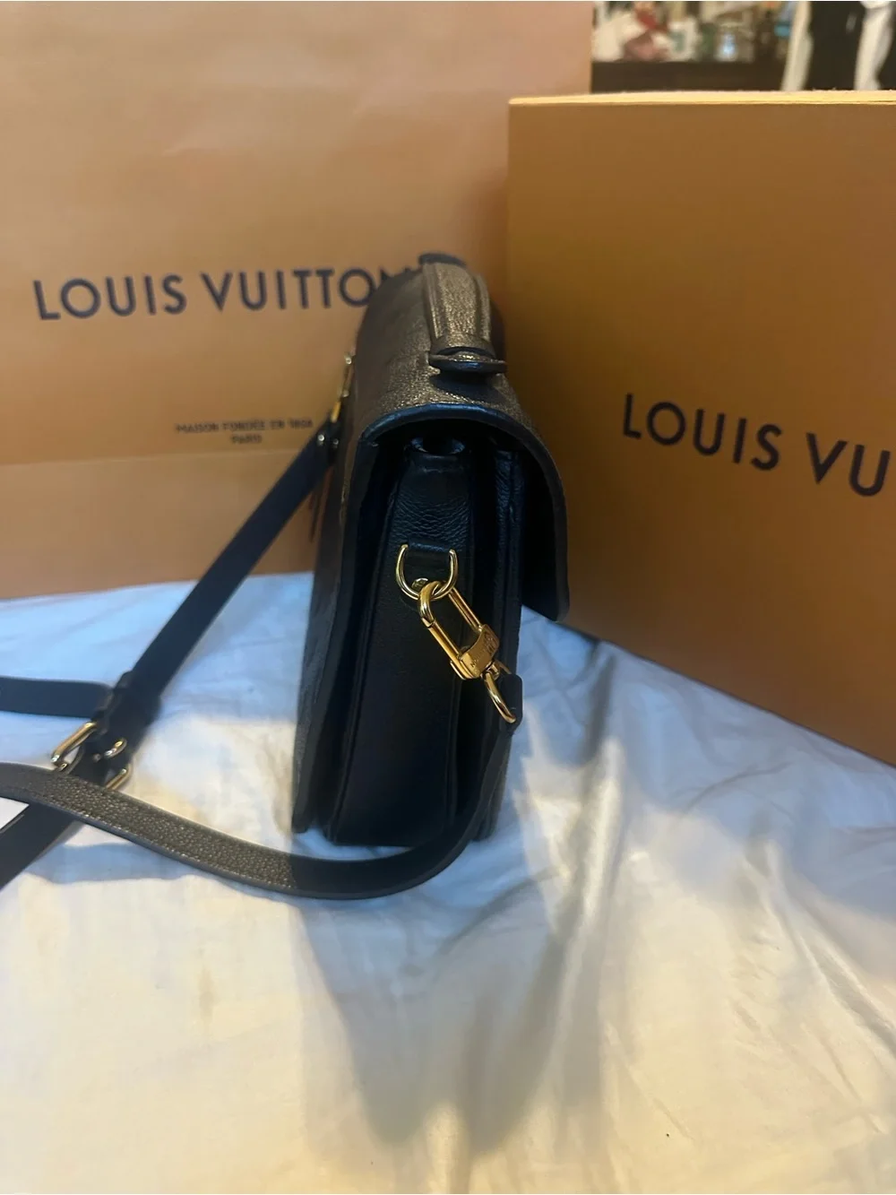 Louis Vuitton compact embossed